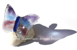 Kleine paarse vlinder van glaskunst