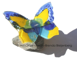 Speels kleurige vlinder van glas
