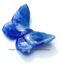 Kleine vlinder in blauwe tinten