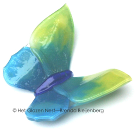 Vlinder van zeegroen en geel glas