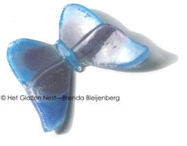 Kleine glas vlinder in paars en blauw