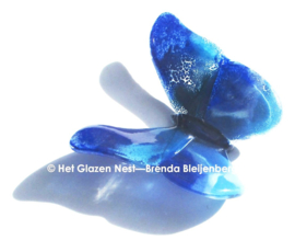 Glazen vlinder in blauwe kleuren