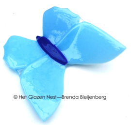 Vliegende vlinder in aqua kleuren