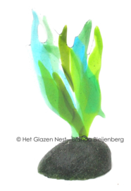 Groen gras als mini urn