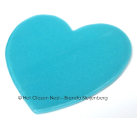 Hart in zee blauw glas