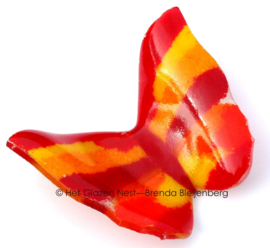 Glazen vlinder in oranje, rood en geel