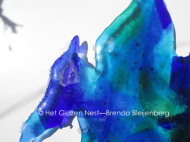 Abstract blauw tegen de muur