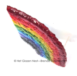 Speelse regenboog in doorzichtig glas
