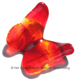 Vlinder in rood en oranje glas