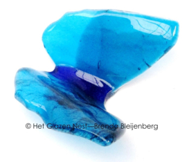 Vlinder in aqua en zeegroen glas