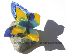 Speels kleurige vlinder van glas