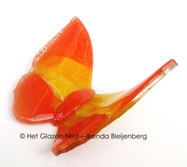 Glazen vlinder in oranje kleuren