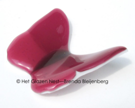 Glazen vlinder in vol roze