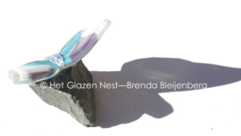 Speelse vlinder van glaskunst