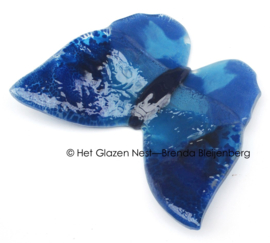 Glazen vlinder in blauwe kleuren