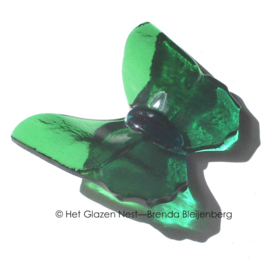 kleine groene vlinder van glas