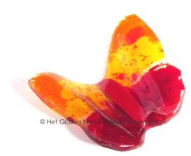 Glaskunst vlinder in oranje en rode kleuren