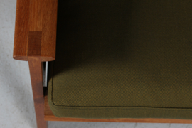 Illum Wikkelsø Capella Sofa of Oak with Green Cushions by Niels Eilersen Denmark. Danish Modern 1960s