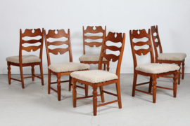 Set of 6 Danish Henning Kjærnulf Chairs for EG Furniture. Made of Solid Oak with New Sheepskin, 1970s. Danish Modern Furniture.
