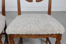 Danish Henning Kjærnulf 2 High Razor Blade Chairs. Made of Solid Oak with New Sheep skin. Danish Modern 1970s.