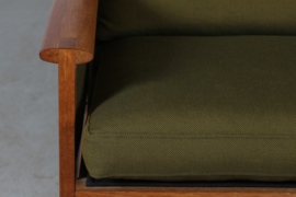 Illum Wikkelsø Capella Sofa of Oak with Green Cushions by Niels Eilersen Denmark. Danish Modern 1960s