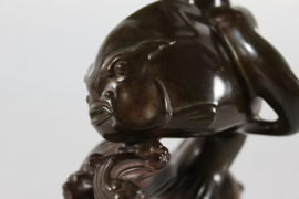 Just Andersen Figurine of Boy on Large Fish Made of Disco Metal, Denmark 1940s.
