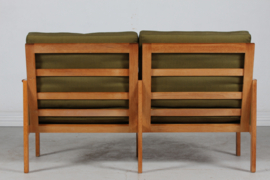 Illum Wikkelsø Capella Sofa of Oak with Green Cushions by Niels Eilersen Denmark. Danish Modern 1960s