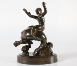 Just Andersen Figurine of Boy on Large Fish Made of Disco Metal, Denmark 1940s.