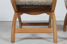 Pair of Danish Henning Kjærnulf Kurul Chairs by EG Møbler of Oak and Sheep Skin