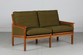 Illum Wikkelsø Capella Sofa of Oak with Green Cushions by Niels Eilersen Denmark. Danish Modern 1960s