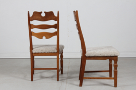 Danish Henning Kjærnulf 2 High Razor Blade Chairs. Made of Solid Oak with New Sheep skin. Danish Modern 1970s.