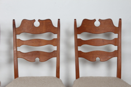 Set of 6 Danish Henning Kjærnulf Chairs for EG Furniture. Made of Solid Oak with New Sheepskin, 1970s. Danish Modern Furniture.