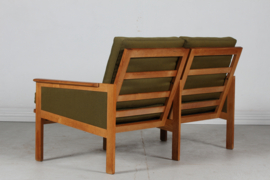 Illum Wikkelsø Capella Sofa of Oak with Green Cushions by Niels Eilersen Denmark. Danish Modern 1960s