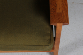 Illum Wikkelsø Capella Sofa of Oak with Green Cushions by Niels Eilersen Denmark. Danish Modern 1960s