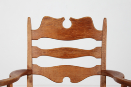 Danish Henning Kjærnulf Razor Blade Armchair for EG Furniture. Made of Solid Oak with New Sheep Skin. Mid-century Danish Modern.