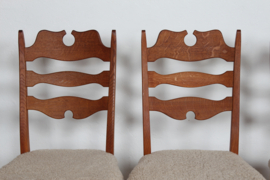Set of 6 Danish Henning Kjærnulf Chairs for EG Furniture. Made of Solid Oak with New Sheepskin, 1970s. Danish Modern Furniture.