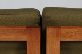 Illum Wikkelsø Capella Sofa of Oak with Green Cushions by Niels Eilersen Denmark. Danish Modern 1960s