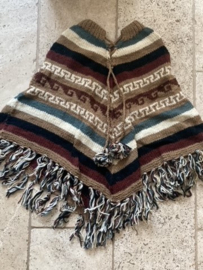 Gebreide Poncho in rustige kleuren