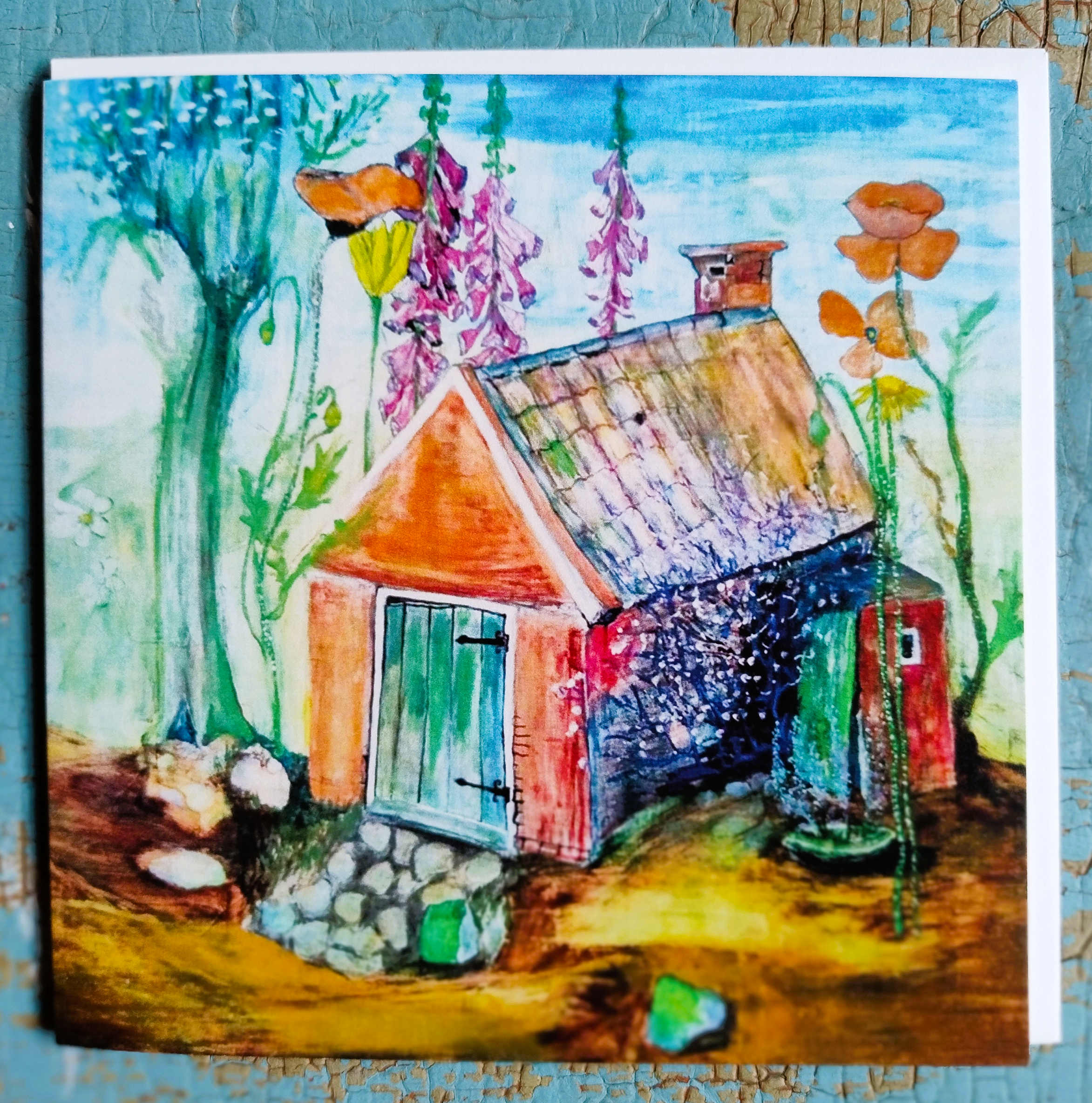 Stookhuisje met bloemen