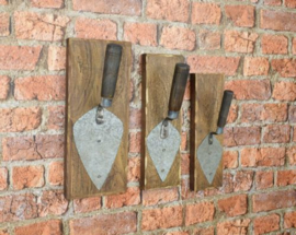 Set van drie troffels op hout