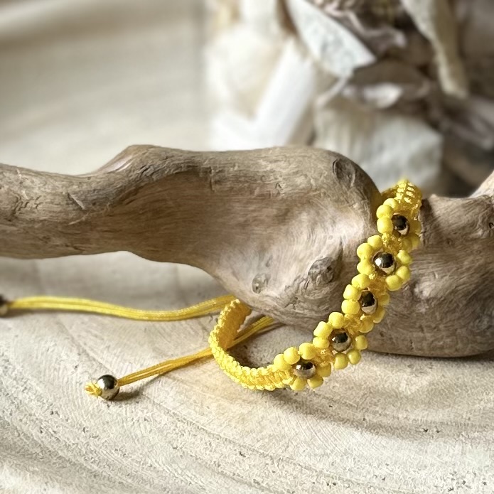 Armbandjes | Gevlochten met bloem