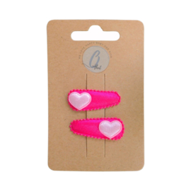 Babyhaarclipje uni felroze met roze hartje