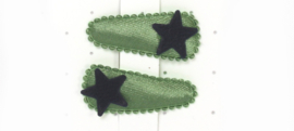 Babyhaarclipje uni groen met zwarte sterretjes