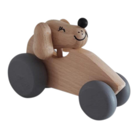 wooden dog in car - natural