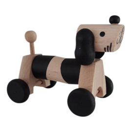 wooden dog on wheels - monochrome