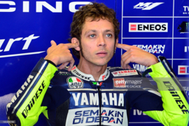 1;12<>Valentino Rossi GP 2014 "Checking the Ear Plugs" mc312140046