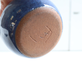 Vintage vaasje in blauwe kleur