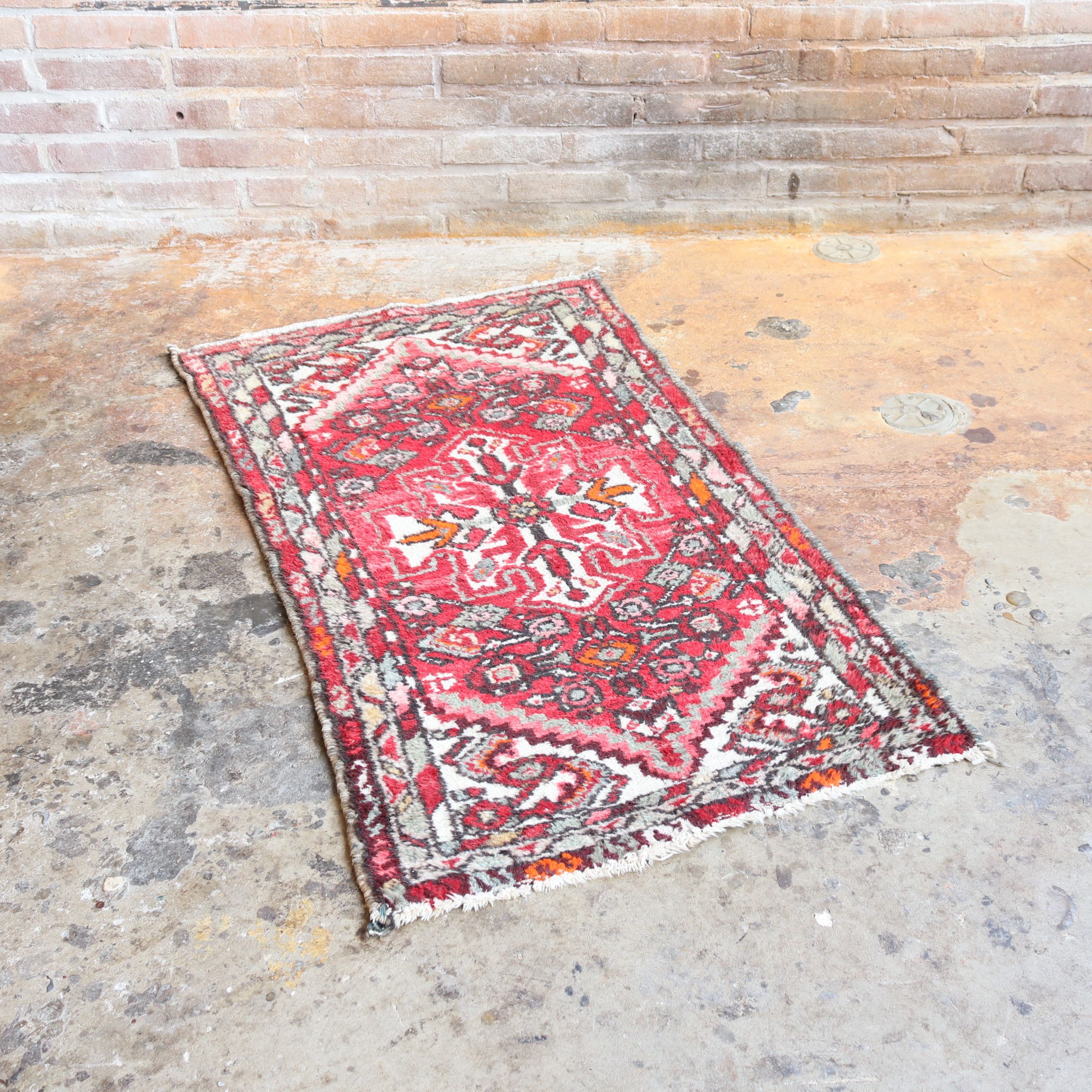 Vintage tapijt roze  118x62 deurmat