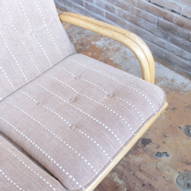 Vintage rotan bank met kussen