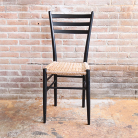 Vintage zwart stoel gevlochten zitting